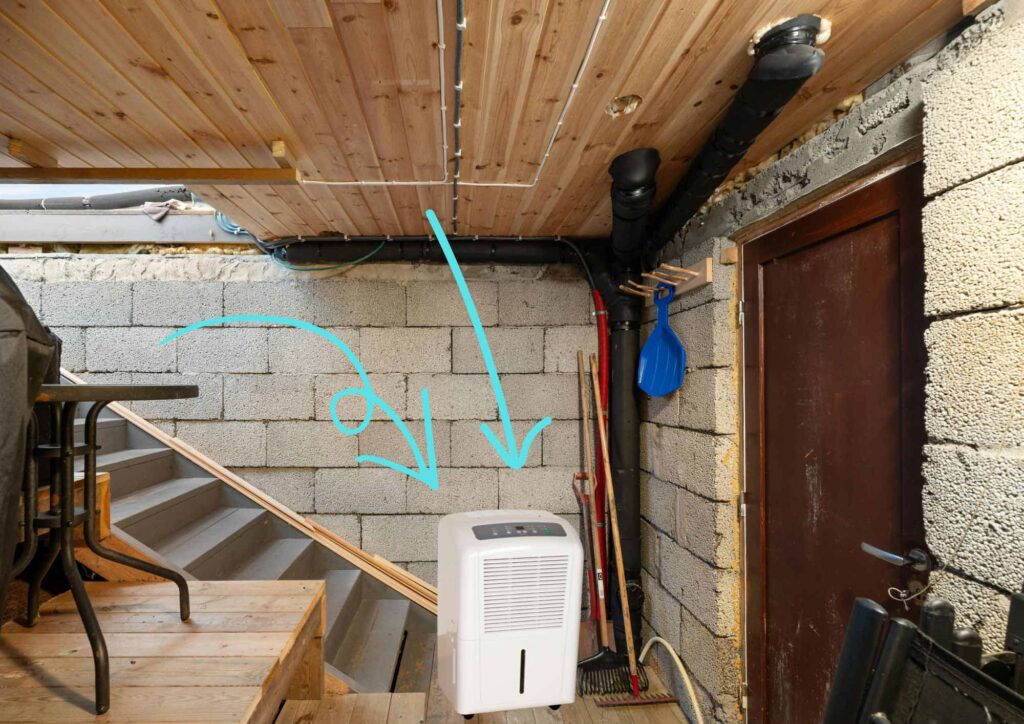 Basement with dehumidifier running during summer to reduce musty smells