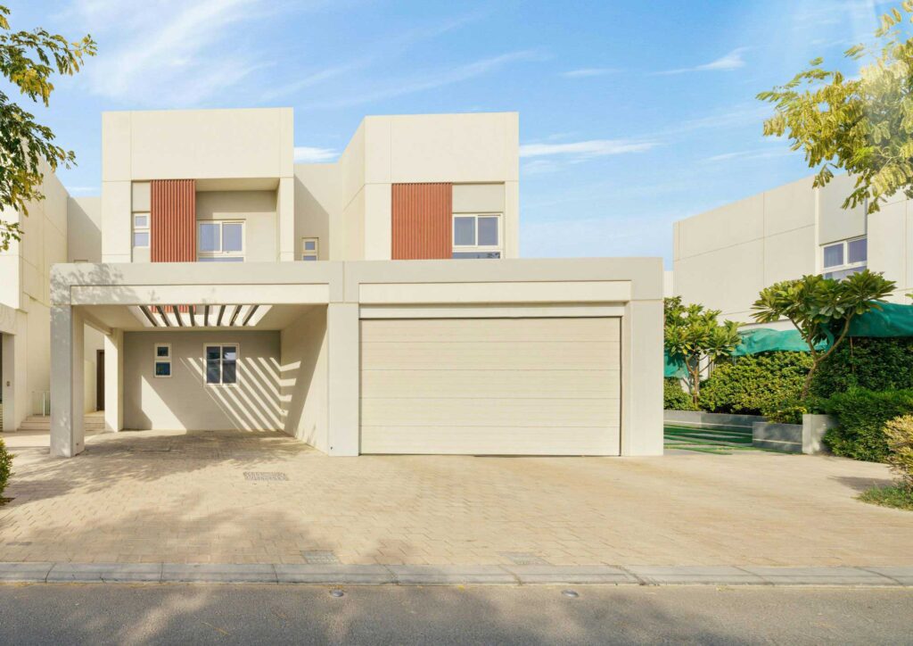 Single-family home showing best colour shades for outer walls with coordinated siding and trim