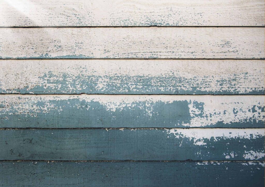 Examples of common exterior house paint mistakes including fading and poor color coordination