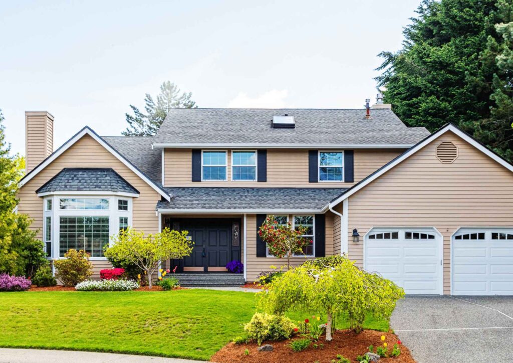 Exterior house showing coordinated siding, trim, door, and roof colours