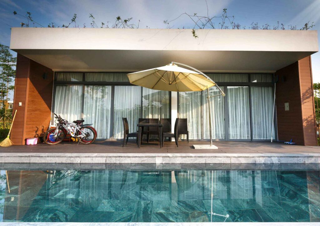 Outdoor patio with PURPLE LEAF Cantilever Umbrella providing shade and comfort
