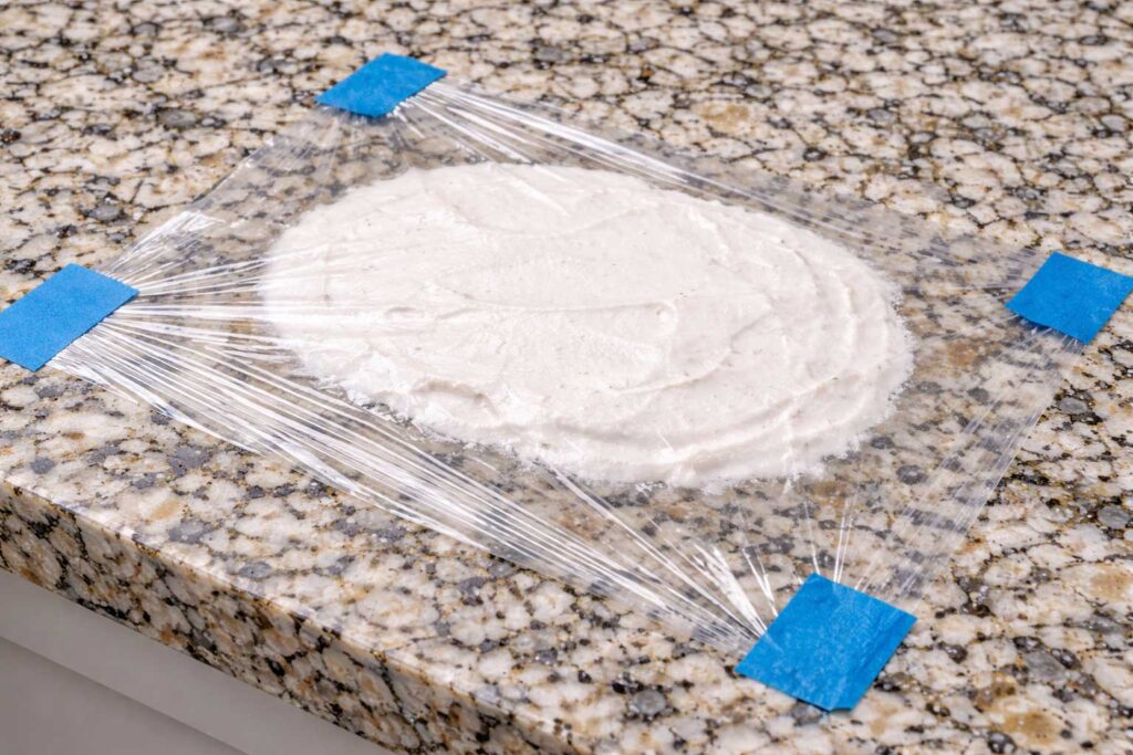 Poultice applied to granite countertop for stain removal