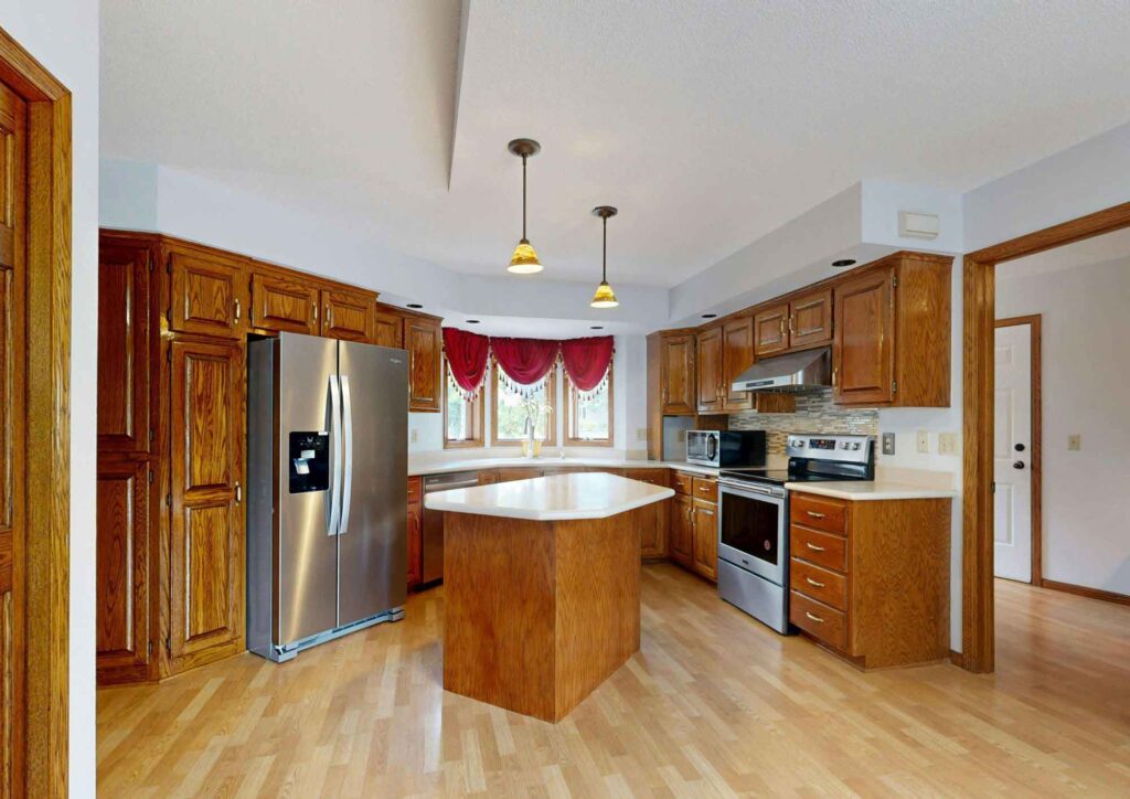 Proper cabinet wall attachment with wall studs for safety.