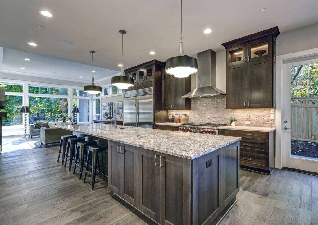 Simple kitchen facelift with updated cabinets, new paint, and backsplash
