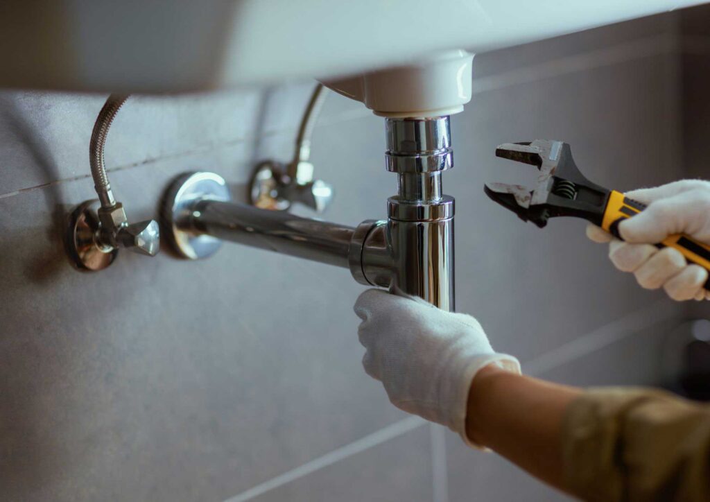 Licensed electrician and plumber ensuring safety and code compliance during kitchen remodel