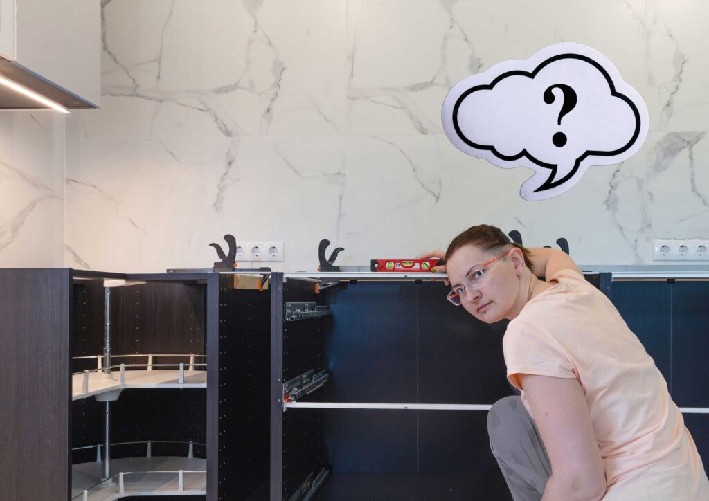 Kitchen with misaligned cabinets that don’t fit properly.