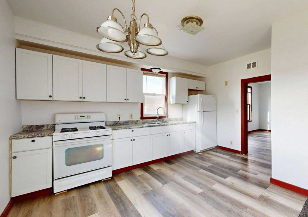 Beautiful modern kitchen featuring prefab cabinets and sleek countertops.