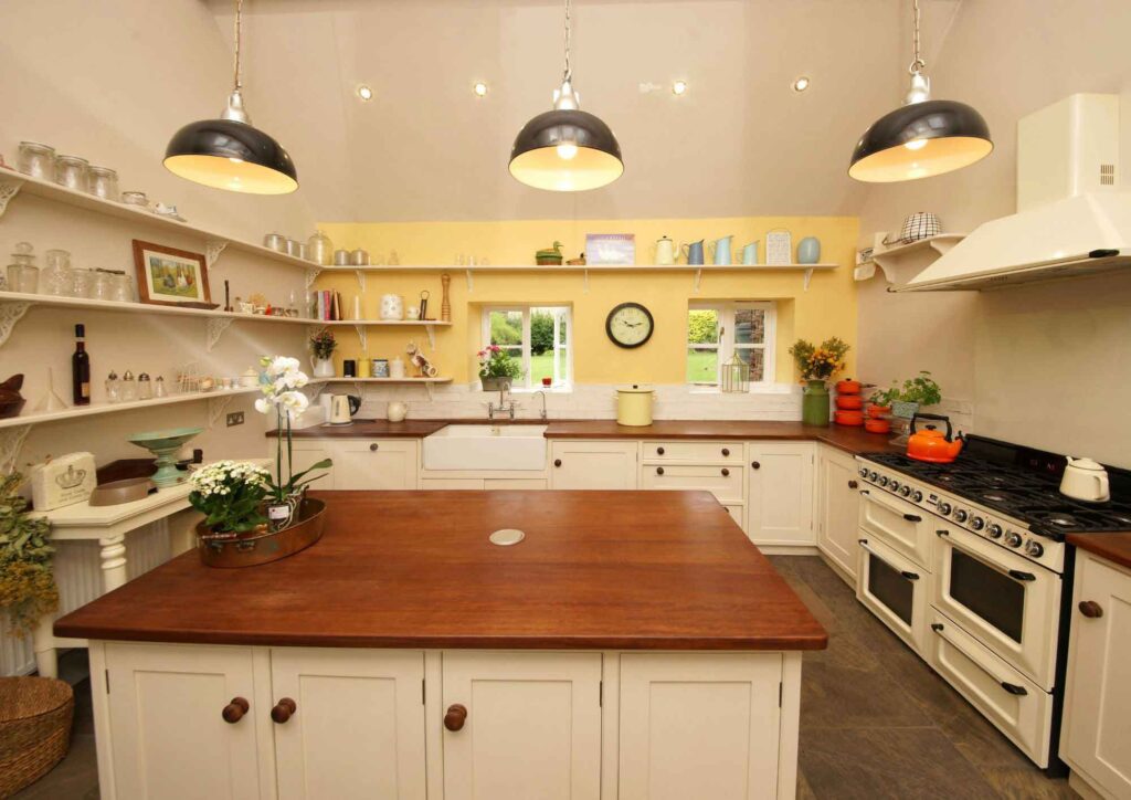 Pendant lights installed above kitchen island.