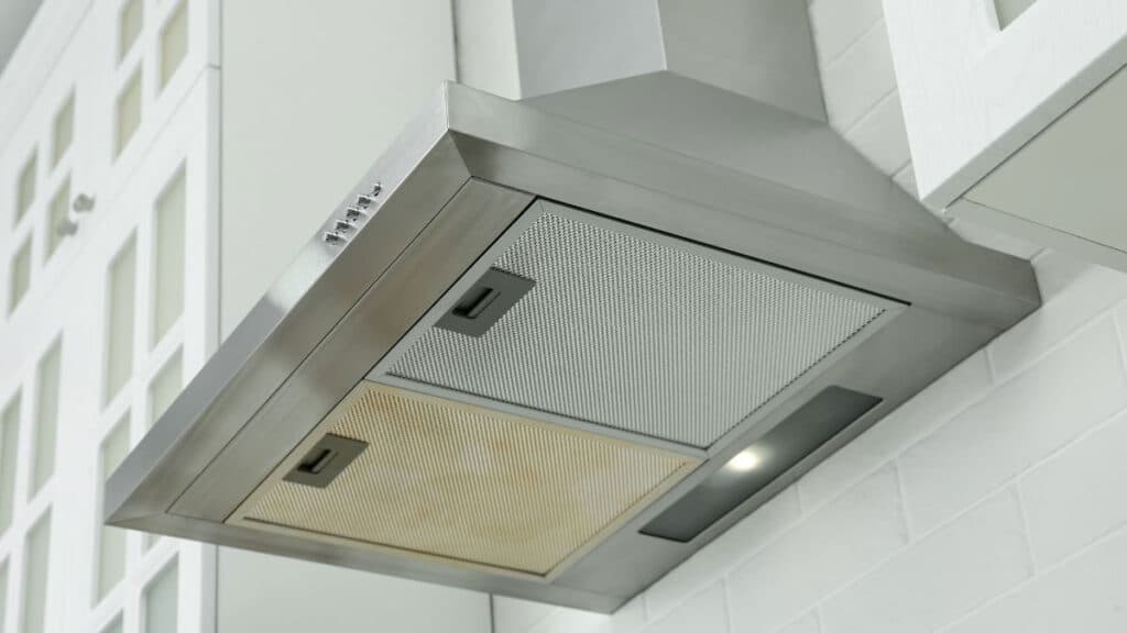 Grease buildup inside range hood fan housing