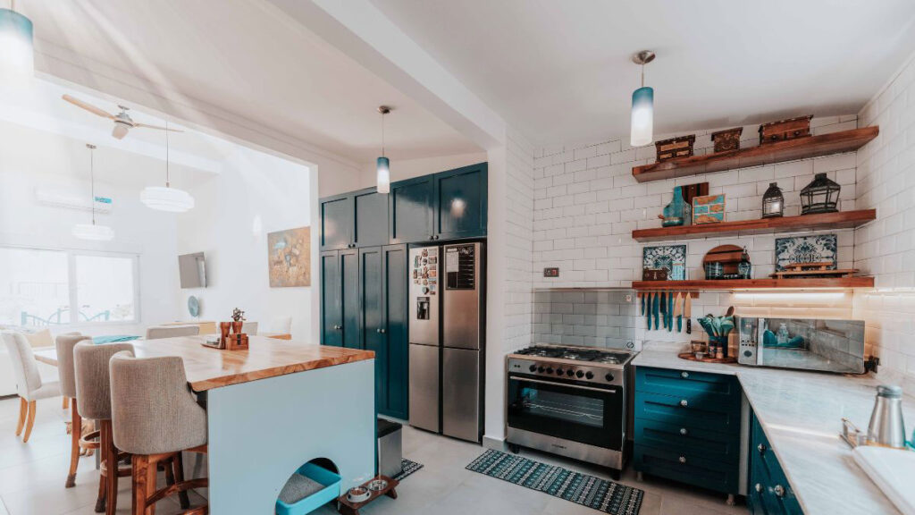 Different kitchen worktop materials including granite, quartz, wood, and laminate in a modern kitchen