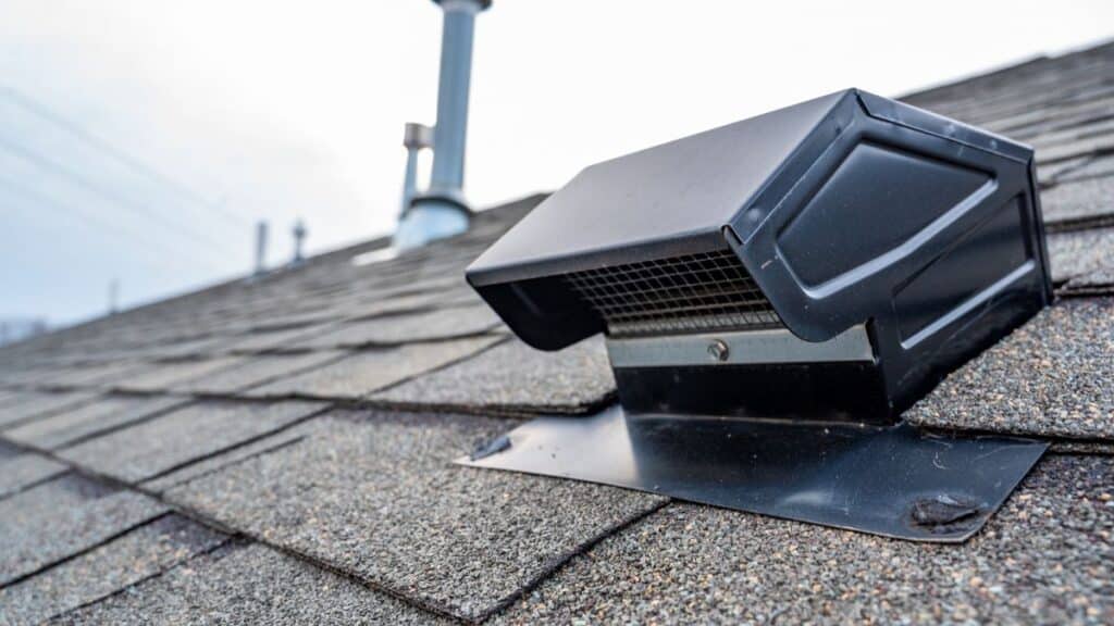 Exterior vent cap on roof allowing bathroom exhaust air to exit