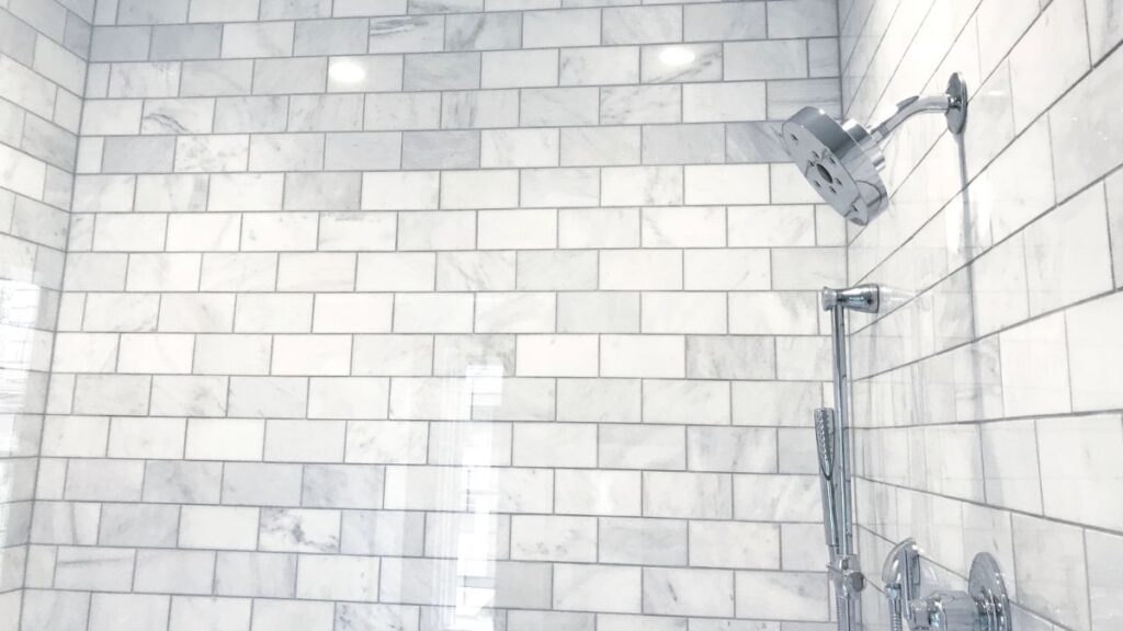 rinsing shower walls before cleaning soap scum