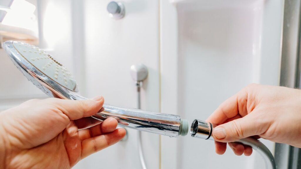 removing shower head from shower arm for vinegar soaking