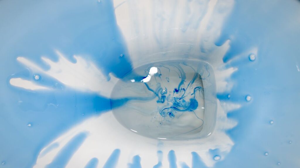 toilet cleaner sitting on hard water stains in bowl