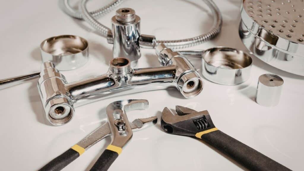 Tools and materials needed for toilet flange repair and wax ring replacement