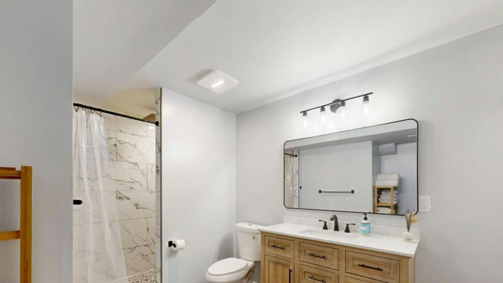 correct placement of bathroom exhaust fan near shower area